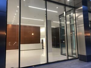 glass windows looking into the newly renovated 1441 L Street NW lobby