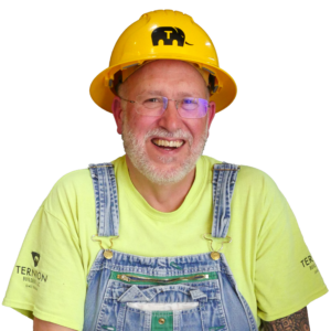 cutout headshot of Mark laughing wearing a Ternion Builders branded hard hat