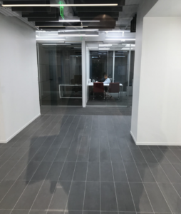 hallway with new flooring on the 5th floor of a building