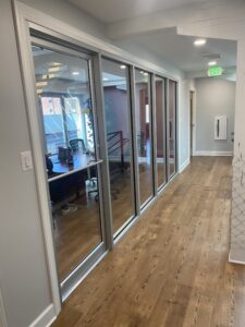 glass enclosed conference room on the newly renovated third floor of the ArachnidWorks building