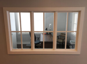 view of a ClearView Communities office through an interior window