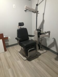 eye exam chair in a newly renovated eye exam room