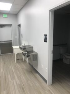 newly installed water fountains by a bathroom