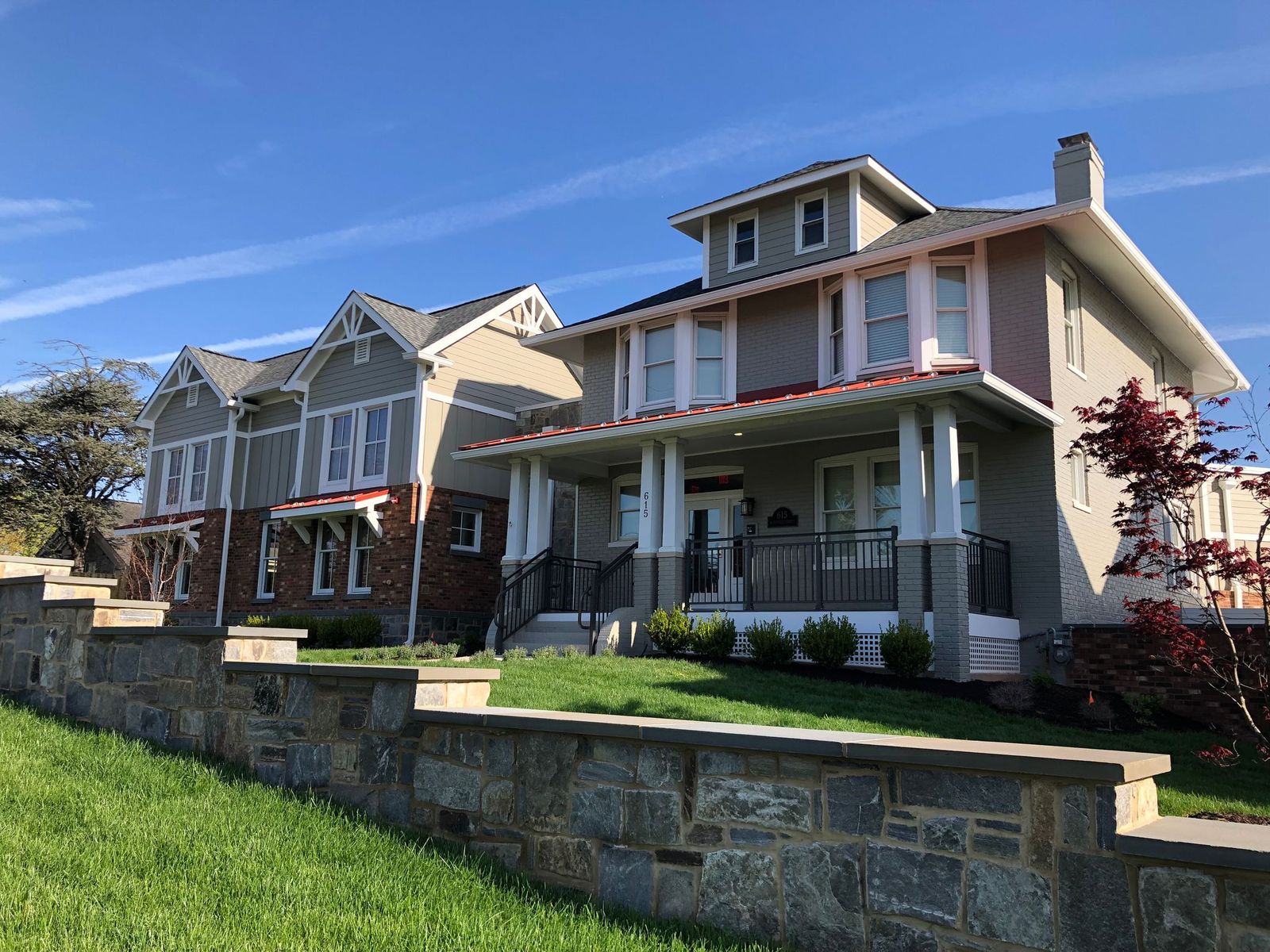 exterior of a row of homes in a neighborhood